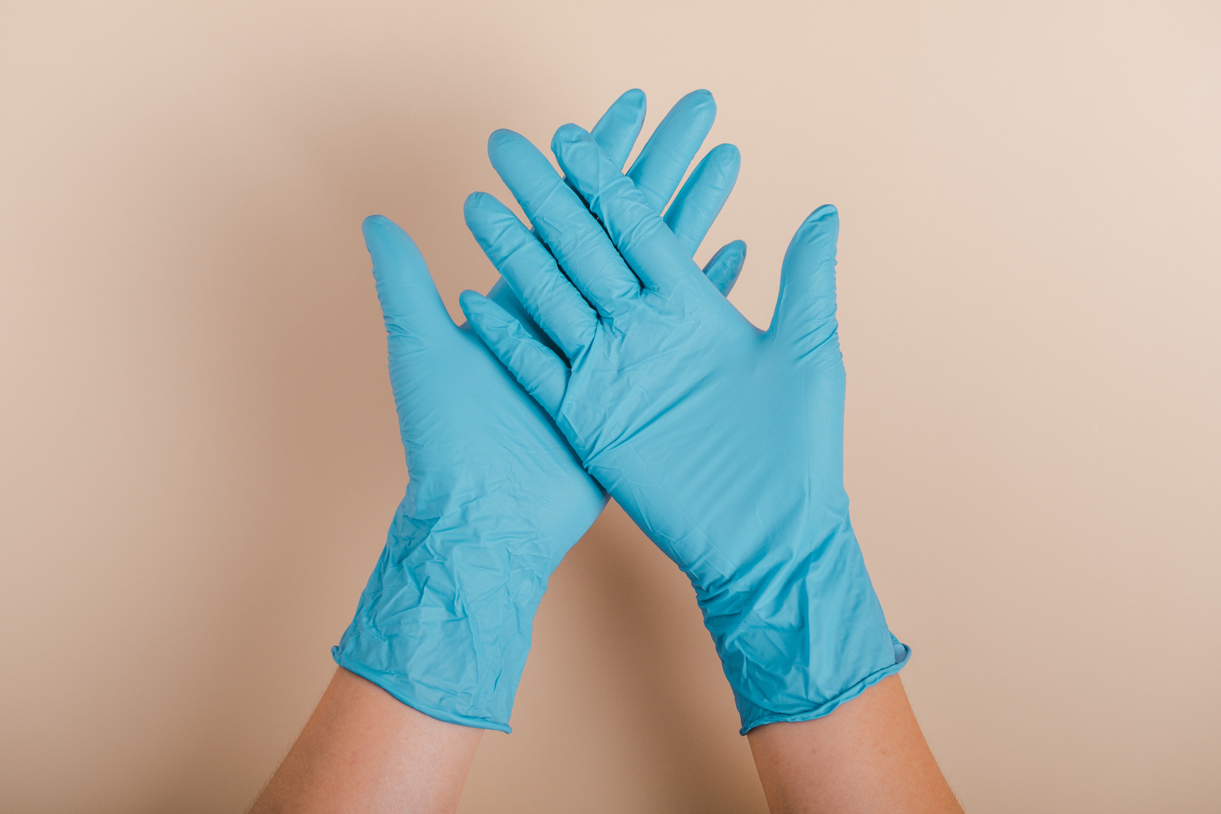 Medical nitrile gloves.Two blue surgical gloves